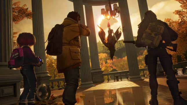 A screenshot of three of Redfall's playable character facing off against a powerful vampire.
